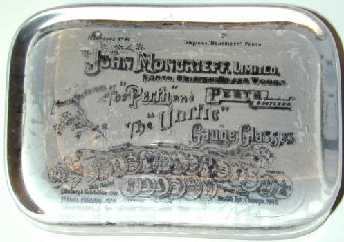 John Moncrieff advertising paperweight